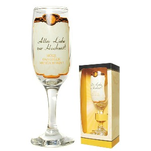 Sektglas mit Aufdruck <i>Alles Liebe zur Hochzeit - Mge das Glck mit Euch sein</i> im schicken Geschenkkarton
<br>
<br>Glas, 19 x 6,5 cm / 190 ml
<br>